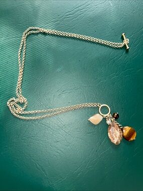 Lia Sophia Gold-Tone Multi Charm Necklace with Brown & Cream Accents